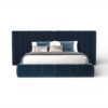 Twilight Splendor Bed with tufted blue velvet headboard and plush base.