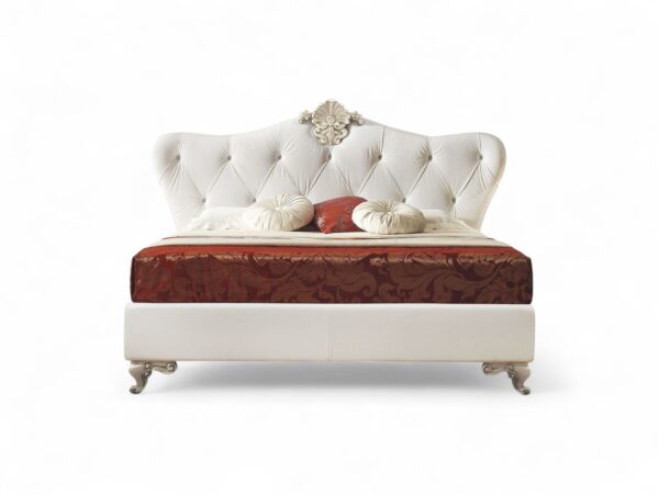 Onyx Grandeur Bed with tufted upholstery and intricate detailing