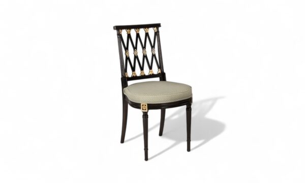 Empire-style wooden armchair with gold detailing and fluted legs