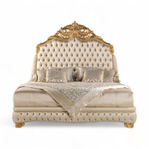 Regal high-back headboard with ornate carved crest in gold finish