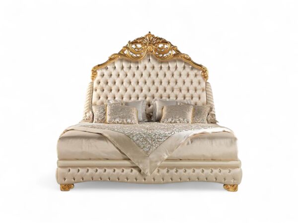 Regal high-back headboard with ornate carved crest in gold finish