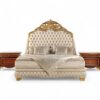 Imperial Majesty Bed with tufted pearl upholstery and ornate gold carved headboard