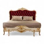 Dolce Vita Bed with deep red velvet and ornate gold carvings