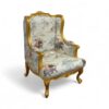 Luxurious lounge chair with plush fabric and golden accents