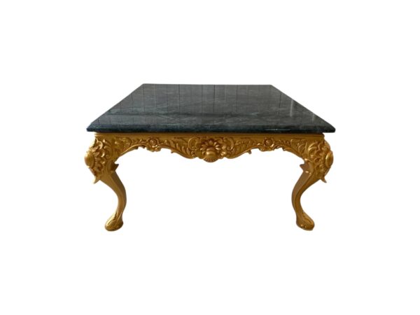 Elegant coffee table with detailed gold craftsmanship