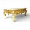 Luxury gold coffee table with hand carved details