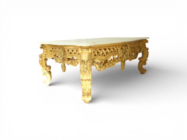 Luxury gold coffee table with hand carved details