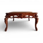 Victorian coffee table with hand-carved wooden detailing