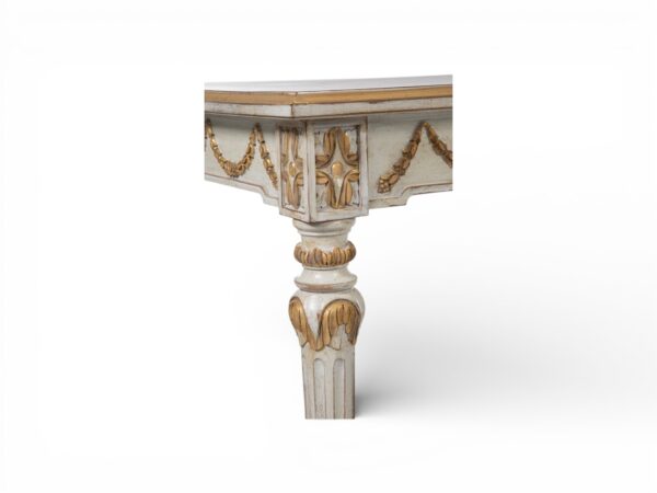 Handcrafted dining table with classic garland motifs