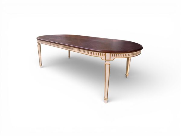 Elegant dining table with sculpted wooden details