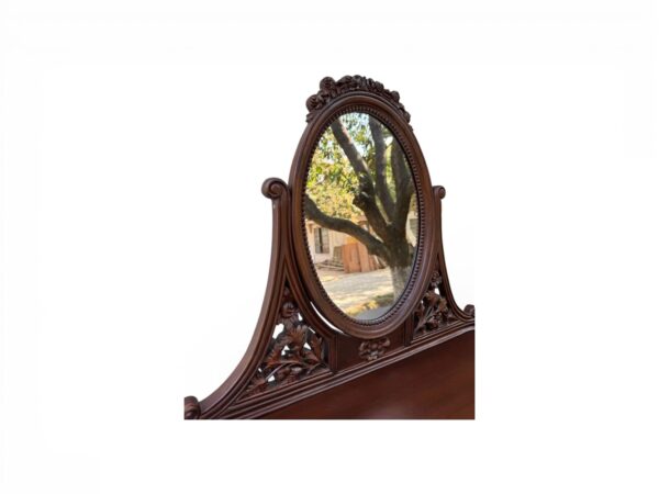 Handcrafted dresser with ornate mirror