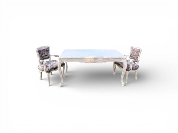 Solid wood table with botanical carving accents