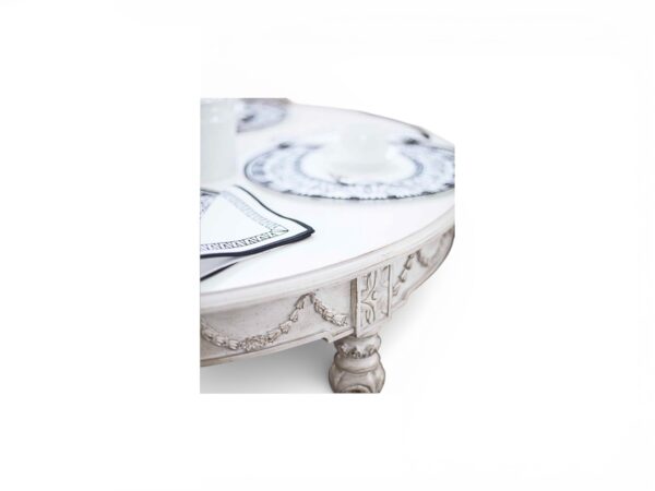 Luxury round dining table with carved apron