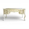 Ornate wooden writing desk with drawers