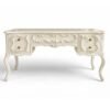 Ornate wooden writing desk with drawers
