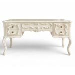 Ornate wooden writing desk with drawers