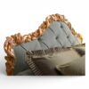 Luxury tufted bed with refined carved detailing