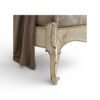 Classic carved wooden bed with elegant detailing