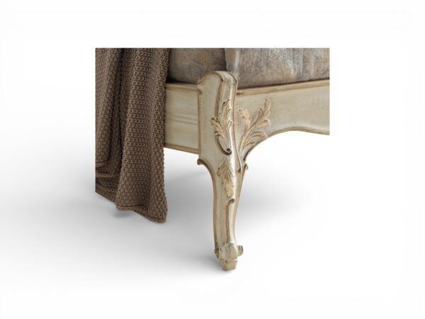 Classic carved wooden bed with elegant detailing