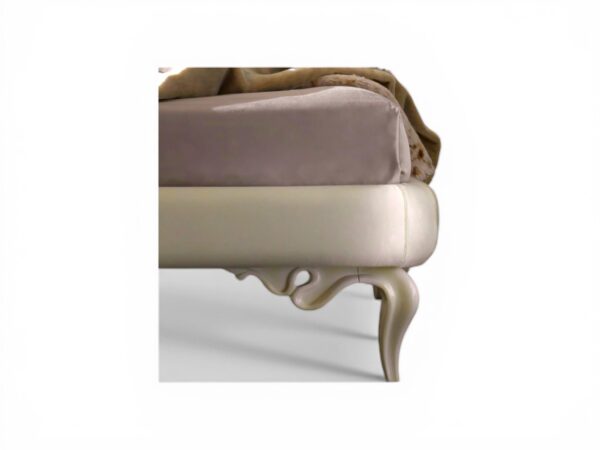 Classical luxury bed with curved legs and upholstery