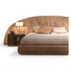 Extended upholstered headboard bed design