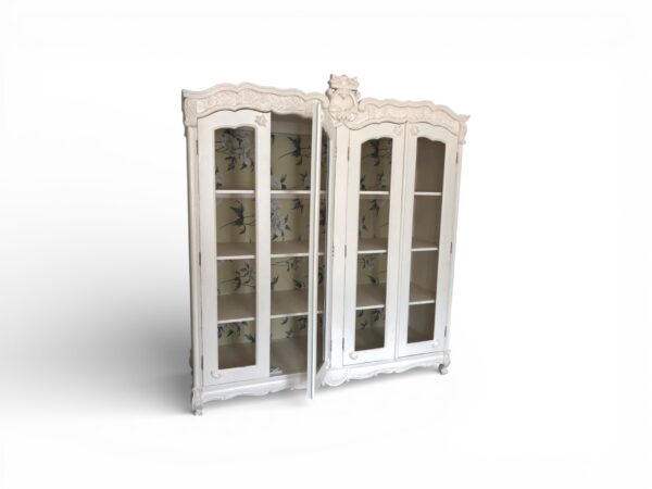Wide display cupboard with refined carved detailing