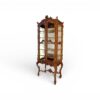 Grand carved wooden glass curio cabinet