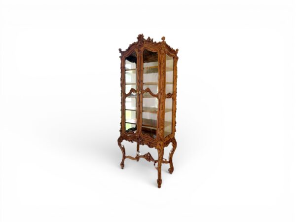 Grand carved wooden glass curio cabinet