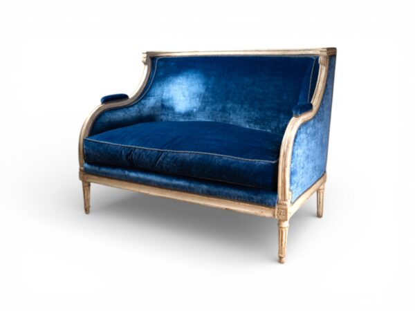 Luxury blue velvet loveseat with gilt wooden frame