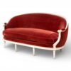 Elegant garnet velvet sofa with curved backrest