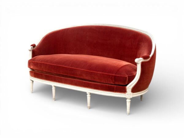 Elegant garnet velvet sofa with curved backrest