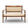 Empire style wooden settee with gold accents