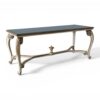 Elegant dining table with scroll legs