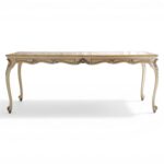 Elegant dining table with floral carving
