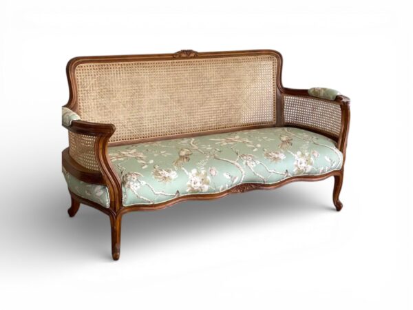 Luxury wicker sofa with polished wooden frame