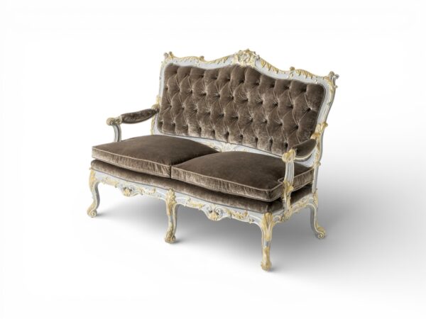 Rococo style loveseat with carved white and gold frame