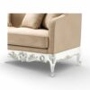 Classic ornate settee with soft bisque upholstery