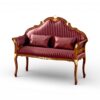 Heritage style carved loveseat with antique gold accents
