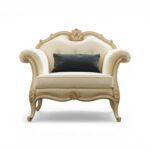 Classic upholstered armchair with curved arms