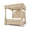 Luxury carved teakwood bed with ornate canopy