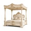 Luxury carved canopy bed with French detailing
